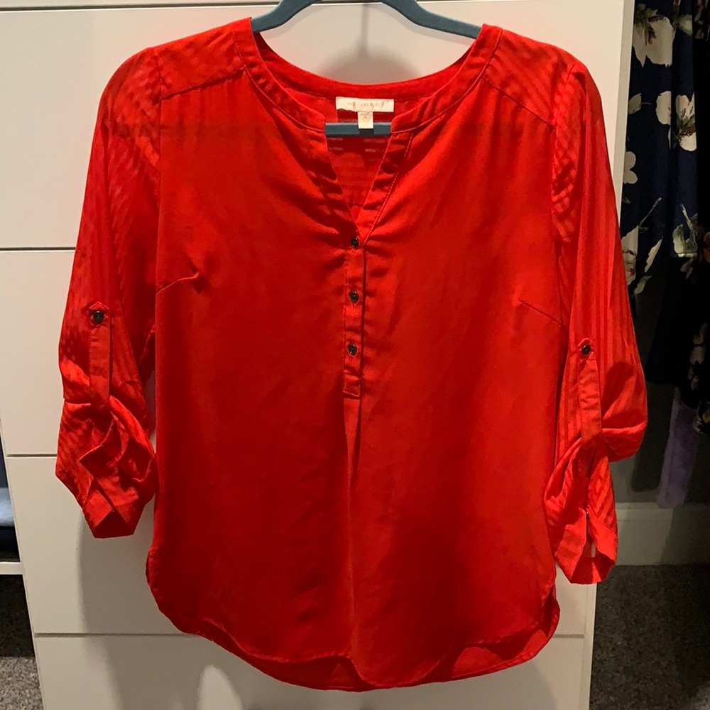 Red blouse with 3/4 length sleeves
